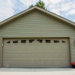 Raised steel panel garage door